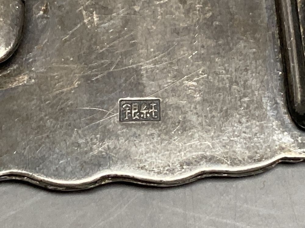 An early 20th century Chinese Export white metal belt by Wang Hing, Hong Kong and other items.